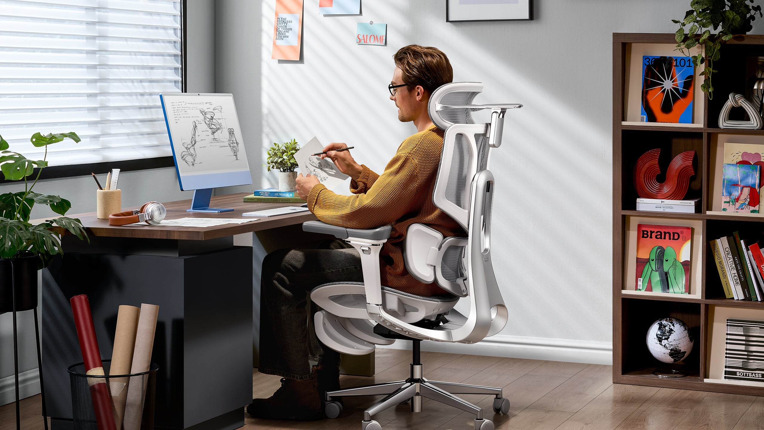 Modern home office setup with HBADA E3 Pro ergonomic chair.