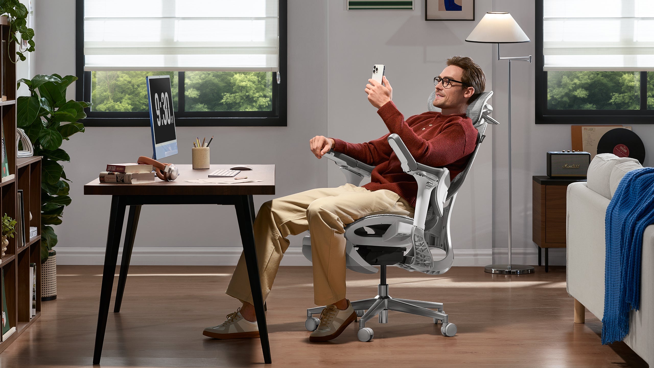 Home office with HBADA E3 Pro ergonomic chair for productivity.